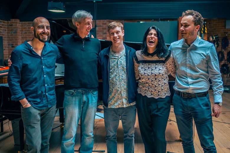 Sam Braysher (pictured centre) and band in the studio – Photo by Dan Redding